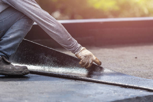Professional Basement Waterproofing technician working in Lakeside, VA